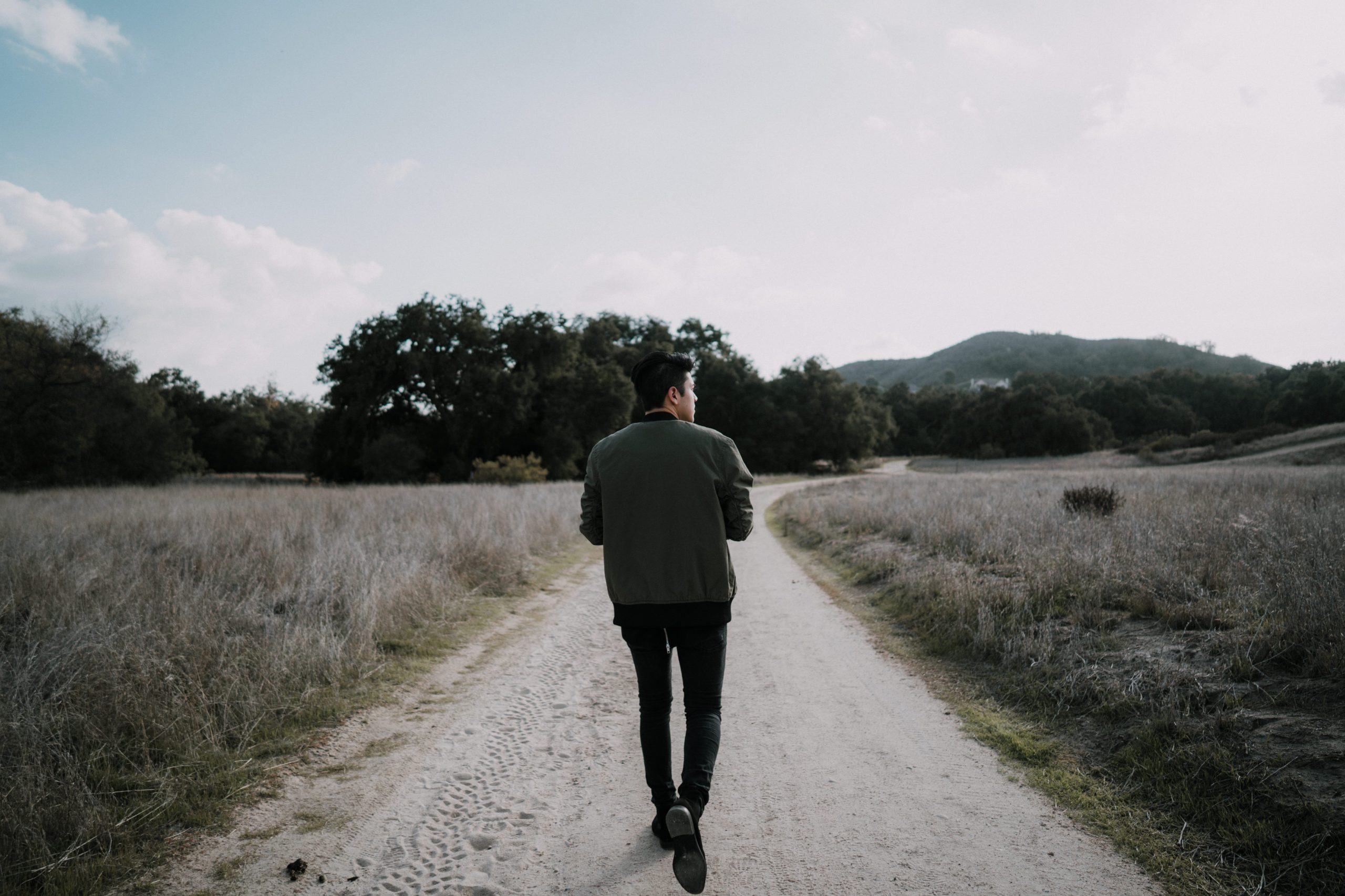 man walking on a path