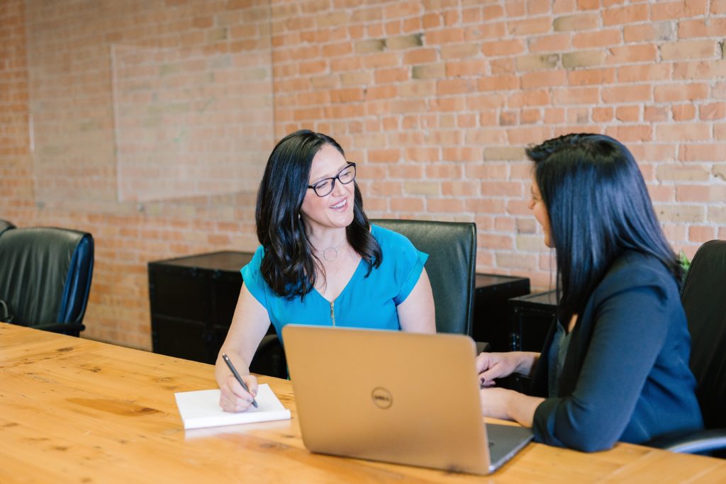 two women having a church staff evaluation